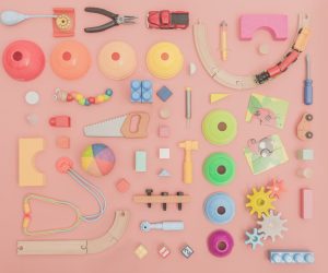 assortment-of-toys-on-pink